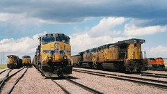 Railroad tracks locomotives train