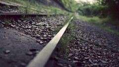 railway depth of field outdoors Plants stones