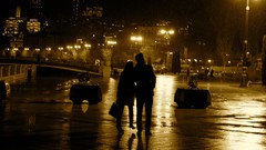 Rain broken romantic pair Baku boulevard