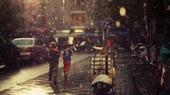 Rain children running streets