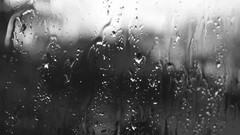 Rain glass black and white water drops