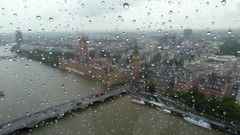 Rain glass London England storm London Eye River Thames 