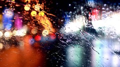 Rain lights cities rain on glass