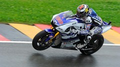Rain wet Yamaha grand prix moto gp motorbikes Jorge Lorenzo 