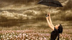 Rain woman Umbrellas arms raised