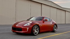 Red cars front nissan 370z MAGMA