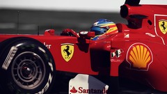 Red Ferrari races formula one
