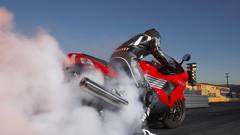 Red Kawasaki smoke bike
