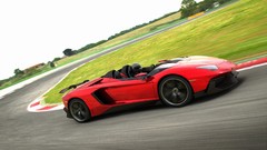 Red track cars Lamborghini side view helmets vehicles motion 