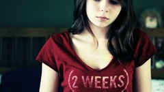 Red woman faces Zara Jay