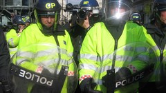 Riot police protest