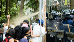 Riot police protest