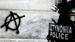 Riots police paint spray