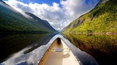 river reflection boat water landscape clouds vehicle