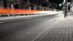 road selective coloring long exposure light trails City street