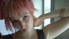 Room woman pink hair blue eyes freckles teen