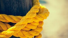 Ropes closeup Wood depth of field yellow