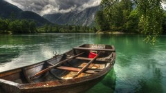 Sand nature water Mountains clouds sky lonely shore greenery 