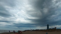 Sand Sea clouds rain Italy