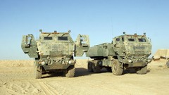 Sand War round Guns dust Army rocket wheels fight shells 