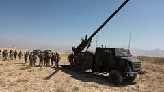 Sand War round Guns France dust Army wheels fight soldiers 