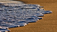 Sand waves shore Sea