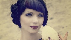 Sand woman lips faces blue eyes