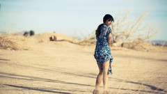 Sand woman outdoors models photo shoot black hair Michael 