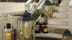 Sand yellow fire white lights Candles shells Wood stairs 