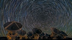 Satellite dish outer space long exposure star trails