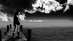 Sea clouds black and white woman dock Actress mila kunis