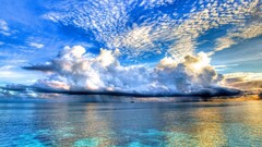 Sea clouds Island sky horizon cyan blue