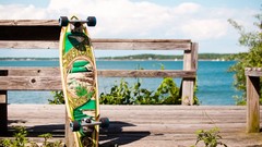 Sea clouds Plants fences blurred background longboard 