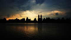 Sea clouds silhouettes city