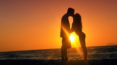 Sea couple silhouettes Beaches sunlight kissing sun flare