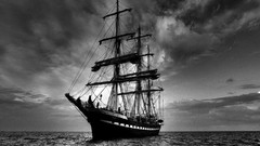 Sea nature clouds dark black and white Boats sailing