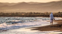 Sea nature Mountains woman lonely Beaches waves walking hoodies 