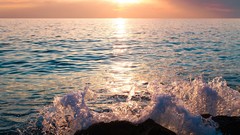 Sea nature rocks waves splashes ripples sunlight