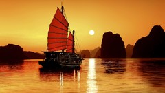 Sea nature sun Boats silhouettes rocks reflections Viet Nam