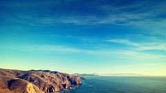 Sea ocean rocks skies