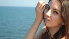 Sea rock eyes woman park street