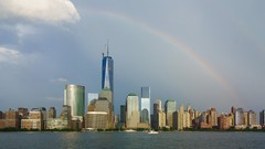 Sea Skyscrapers Cranes Manhattan USA buildings rainbows 