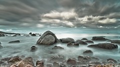 Sea stones clouds