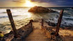 Sea sun foam light descent ladder horizon rocks waves steps