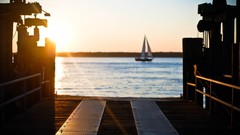 Sea water Sailboats silhouettes piers sunlight