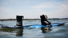 Sea water Shoes reflections blue skies wakeboard