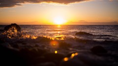 Sea water waves bokeh sunlight