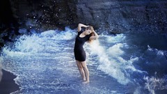 Sea water woman rocks