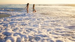 Sea waves little girl