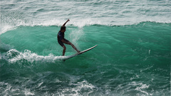 Sea waves surfing surfers